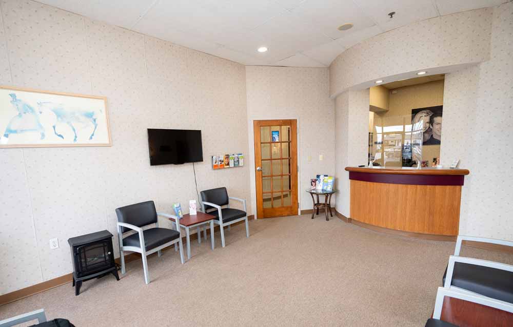 Jackson Family Dental patient brushing teeth